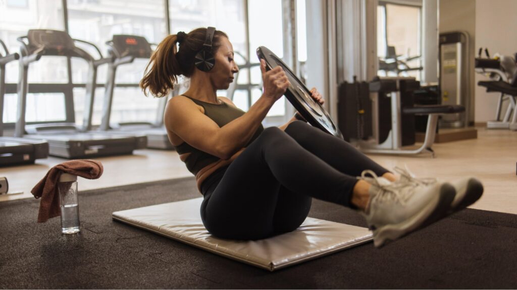 Woman working out in an indoor gym 