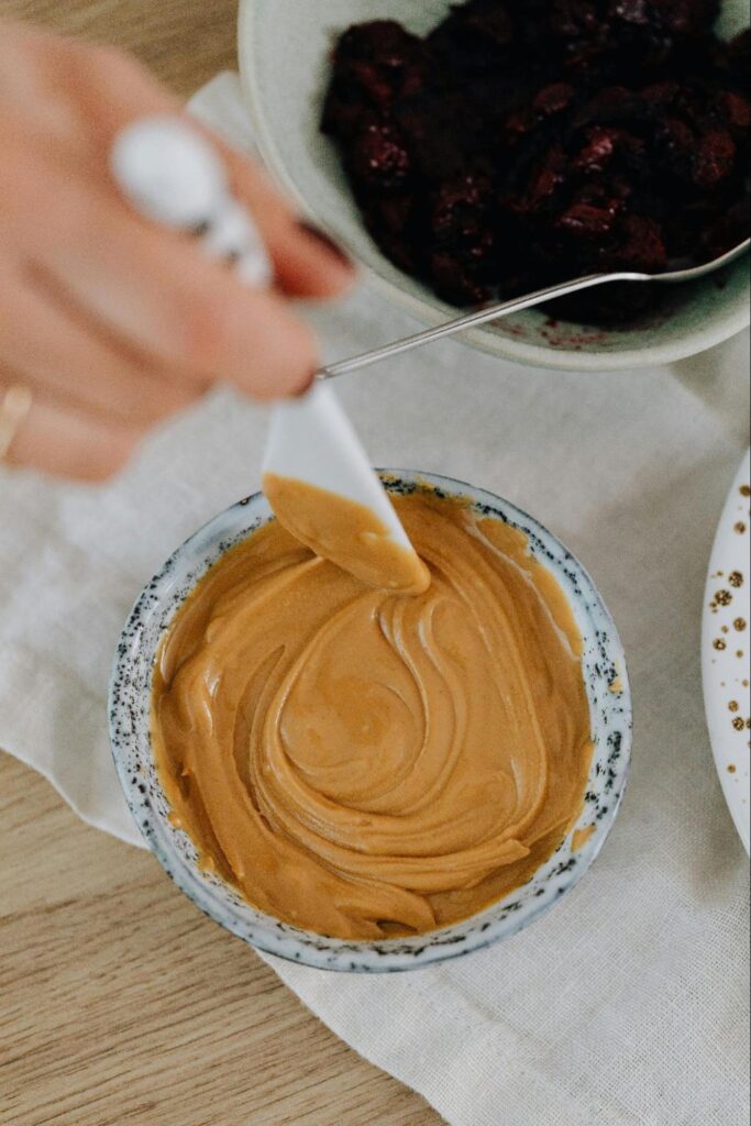 A bowl of peanut butter Source - Pexels